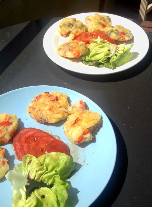 Potato and red pepper cakes with salad